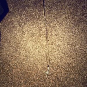 Gold chain w/ sunburst cross pendant